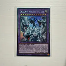 Yugioh RA04-EN055 - Dragon Master Magia - Collectors Rare - Image 1