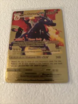 2019 Pokemon Charizard GX Gold Foil Fan Card - Image 1