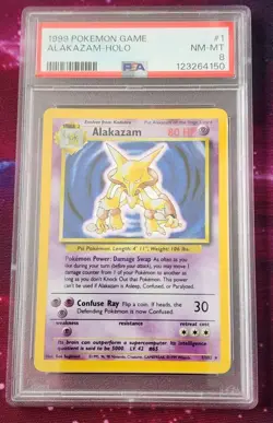 1999 Pokemon Game Alakazam Holo #1 PSA 8 NM-MT Card - Image 1