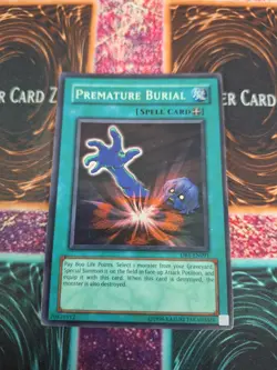 Yugioh Premature Burial DB1-EN091 Super Rare Unlimited Moderately Played - Image 1