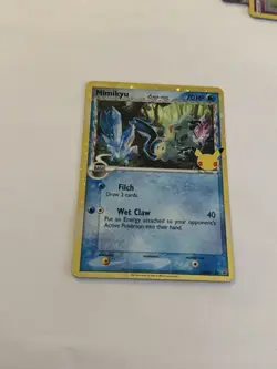 Pokemon TCG Mimikyu SWSH136 Celebrations Delta Species NM - Image 1