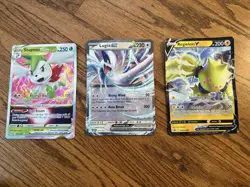 Jumbo Three Card Pokemon Lot, Including Shaman Lugia And Regieleki And A Toe - Image 1