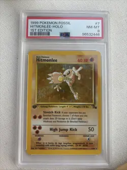 1999 Pokemon Fossil Hitmonlee Holo 1st Edition PSA Grade 8 - Image 1
