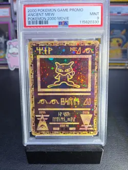 2000 POKEMON GAME MOVIE POKEMON 2000 MOVIE ANCIENT MEW PSA 9 w/ Swirl Holo - Image 1