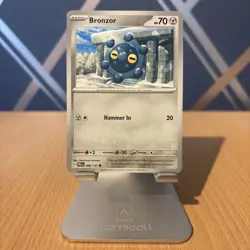 066/131 Bronzor : Common Card : Prismatic Evolutions : Pokemon TCG - Image 1