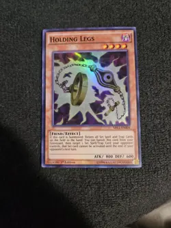 Holding Legs - MIL1-EN004 - Super Rare - 1st Edition YuGiOh! Millennium Pack - Image 1
