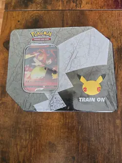 Pokemon Celebrations Lance’s Charizard V Tin Big 25th Anniversary - Image 1