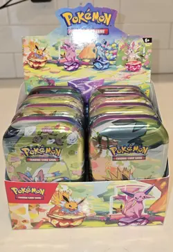 Pokemon TCG Prismatic Evolutions Mini Tin w/ Display Box (8 Tins Sealed) - Image 2