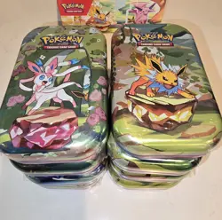 Pokemon TCG Prismatic Evolutions Mini Tin w/ Display Box (8 Tins Sealed) - Image 5