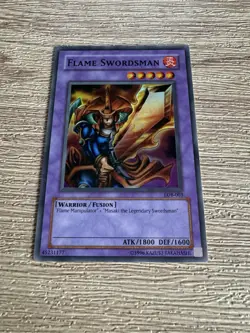 YuGiOh card Flame Swordsman Super Rare LOB-003 - Image 1