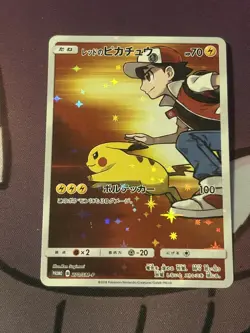 JAPANESE POKEMON PROMO CARD - RED'S (ASH'S) PIKACHU 270/SM-P (2018) ( HOLO) - Image 1