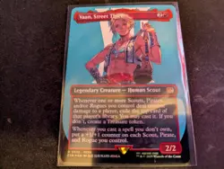 MTG Magic the Gathering SURGE FOIL Vaan, Street Thief Borderless FIN! - Image 1