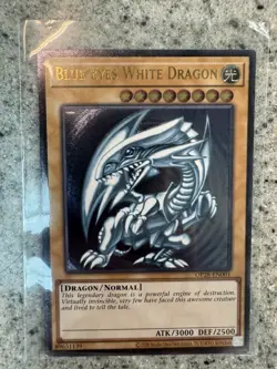 YuGiOh Blue Eyes White Dragon Ultimate Rare OP28-EN001 - Image 1