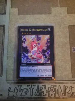 YUGIOH NUMBER 82: HEARTLANDRACO PGLD-EN025 GOLD SECRET 1ST ED NM - Image 1