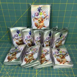 LOT OF 10 - POKEMON - PRISMATIC EVOLUTIONS ETB CARD SLEEVES (65/Pack, 650 Total) - Image 1