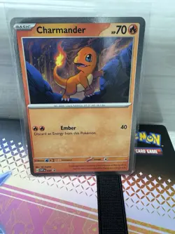 Pokemon TCG Charmander SVP047 HOLO SWIRL 151 Cosmos Holo Black Star Promo - Image 1