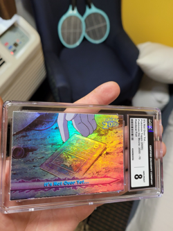 CGC 8 2000 TOPPS POKEMON THE MOVIE 2000 RAINBOW FOIL #70 IT'S NOT OVER YET... - Image 1