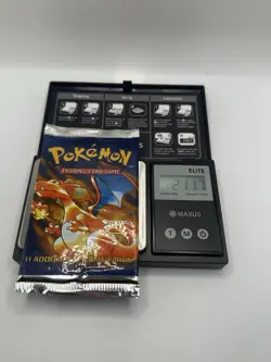 Charizard 1999 Pokemon Base Set Booster Pack 21.17g FACTORY SEALED 742818061582 - Image 1