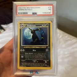 2001 POKEMON NEO DISCOVERY #13 UMBREON-HOLO PSA 7 NEW CERT! Swirl! - Image 1