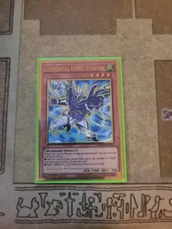YUGIOH ELEMENTAL HERO STRATOS MAGO-EN004 GOLD 1ST ED NM - Image 1