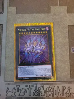 YUGIOH NUMBER 77: THE SEVEN SINS PLG3-EN011 GOLD SECRET 1ST ED NM - Image 1