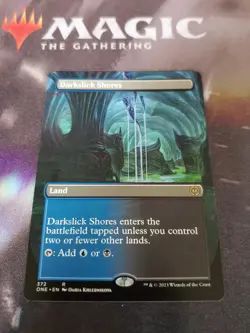 Mtg. Darkslick Shores. Borderless. Phyrexia: All Will Be One. Pack Fresh - Image 1