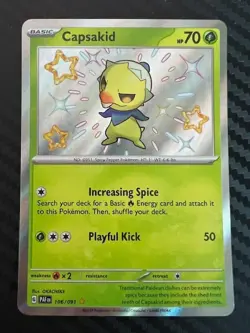 Pokemon TCG Capsakid Holo Shiny Rare Card 106/091 Paldean Fates NM - Image 1