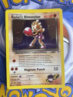 Rocket's Hitmonchan 11/132 Holo SWIRL 1st Edition Gym Heroes Pokemon Card - Image 1