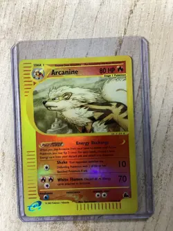 Vintage 2003 Arcanine 3/144 Pokemon Card In Protective Sleeve - Image 1