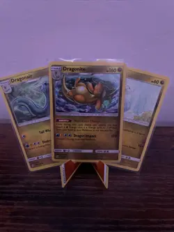 Dragonite 151/236 Unified Minds Holo NM Pokemon Card W/ Evolution Line - Image 1