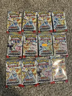 Pokemon Prismatic Evolution Booster Pack x12- Brand New SEALED Lot - Image 1