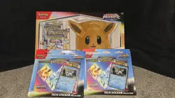 Pokemon Prismatic Evolutions Accessory Pouch And Tech Sticker Lot, 11 Packs - Image 1