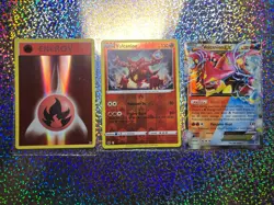 Pokemon: Promo XY173 Volcanion EX; Evolutions Reverse Holo 92/108 Fire Energy - Image 1