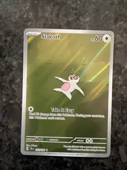 Slakoth 212/191 SV08: Surging Sparks Illustration Rare Near Mint Pokemon card - Image 1