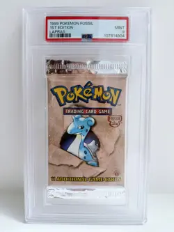 1999 Pokemon Fossil 1st Edition - PSA 9 Booster Pack Sealed - Lapras - Image 1
