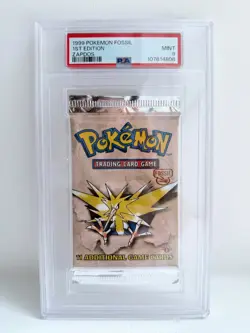 1999 Pokemon Fossil 1st Edition - PSA 9 Booster Pack Sealed - Zapdos - Image 1