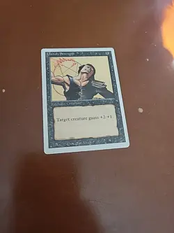 Unholy Strength Magic the Gathering Unlimited Edition Card 1993 - Image 1