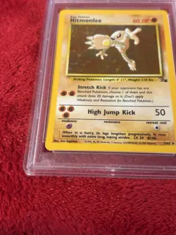 1999 POKEMON FOSSIL #7 HITMONLEE-HOLO PSA 7 - Image 4