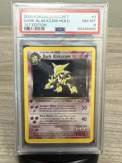 2000 POKEMON ROCKET 1ST EDITION #1 DARK ALAKAZAM-HOLO PSA 8 - Image 1