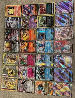 28 Pokemon cards, mixed conditions. Comes with Holos BREAKS, EX, GX, V, and VMAX - Image 1