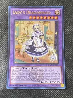 YuGiOh! - Lady's Dragonmaid BLMM-EN049 Ultra Rare 1st Edition Near Mint - Image 1