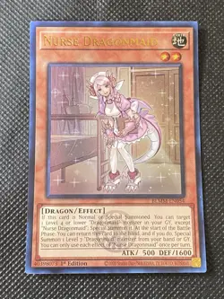 YuGiOh! - Nurse Dragonmaid BLMM - EN054 Ultra Rare 1st Edition Near Mint - Image 1