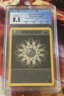 CGC 8.5 NM/M+ Rainbow Energy Team Rocket 1st Edition 17/82 Holo Pokemon Card - Image 1
