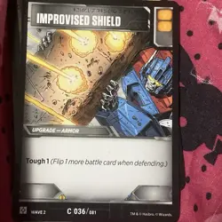Transformers TCG Wave 2 Rise of The Combiners- Card: IMPROVISED SHIELD - Image 1