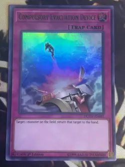 Yugioh: Compulsory Evacuation Device - DUOV-EN097 - Ultra Rare - 1st Edition NM - Image 1