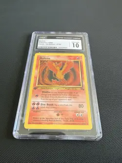 CGC 10 GEM MINT Moltres 1999 Fossil 1st Edition 27/62 Pokemon Card psa - Image 1