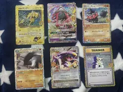 Pokemon Card 25th Anniversary Promo Team Rocket's Thunder - Image 1