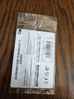 Team Rocket’s Zapdos Pokemon Promo Card - GameStop Exclusive - Holo Rare SEALED! - Image 2