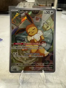 Pokemon TCG Prismatic Evolutions Eevee Promo Card SVP 173 Black Star - Image 1