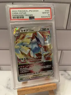 PSA 10 GEM MINT Lugia VSTAR JAPANESE PARADIGM TRIGGER 80 ULTRA RARE Pokemon Card - Image 1